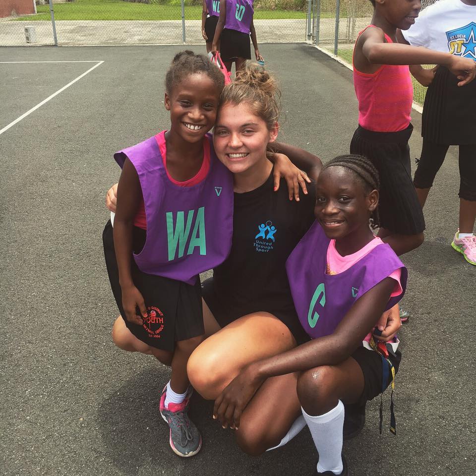 Netball coach and two pupils